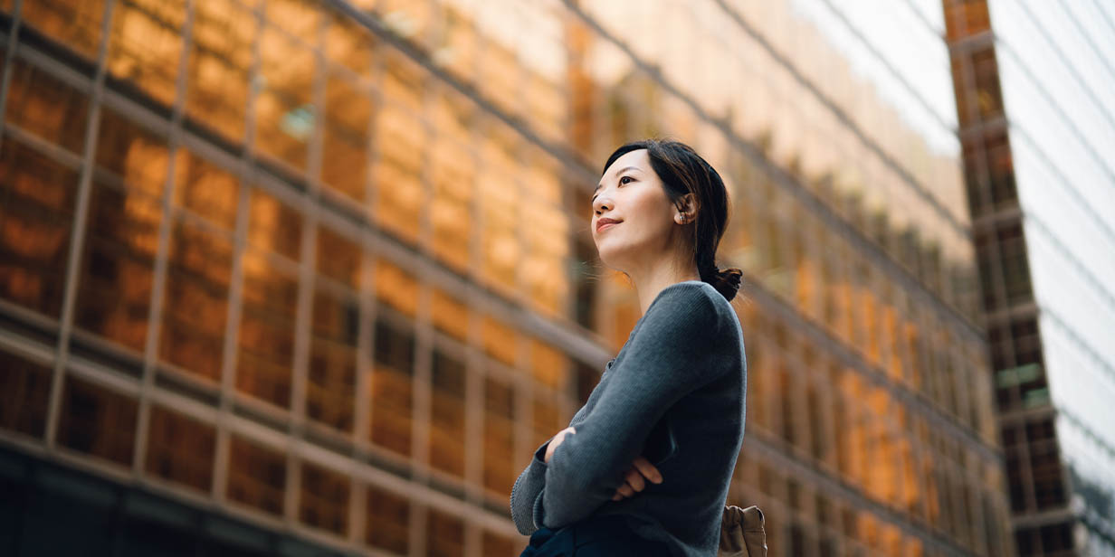 business woman outside building