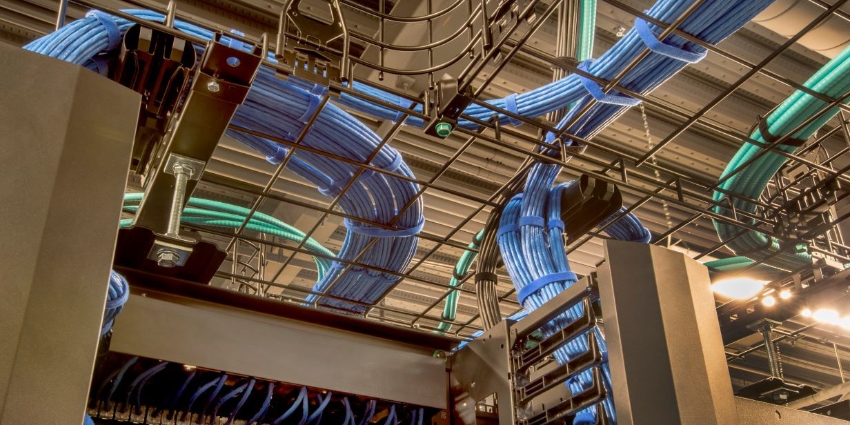 Overhead cable trays in a data center
