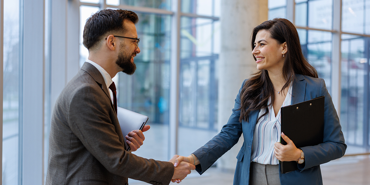 Broker campaign business people shaking hands