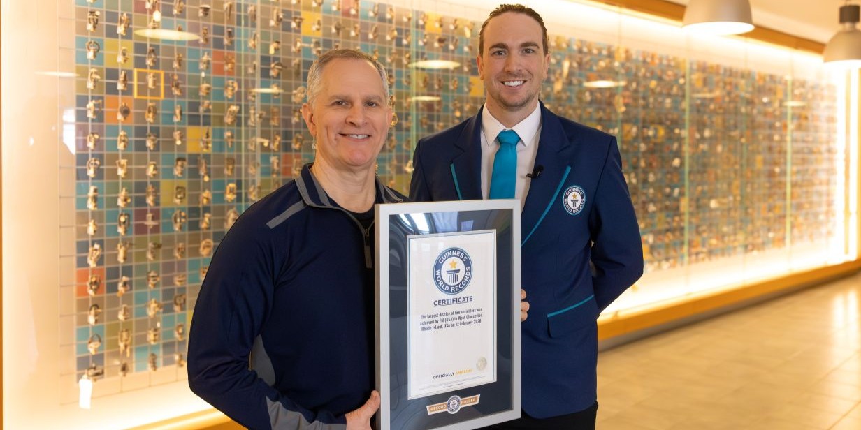 people holding an award