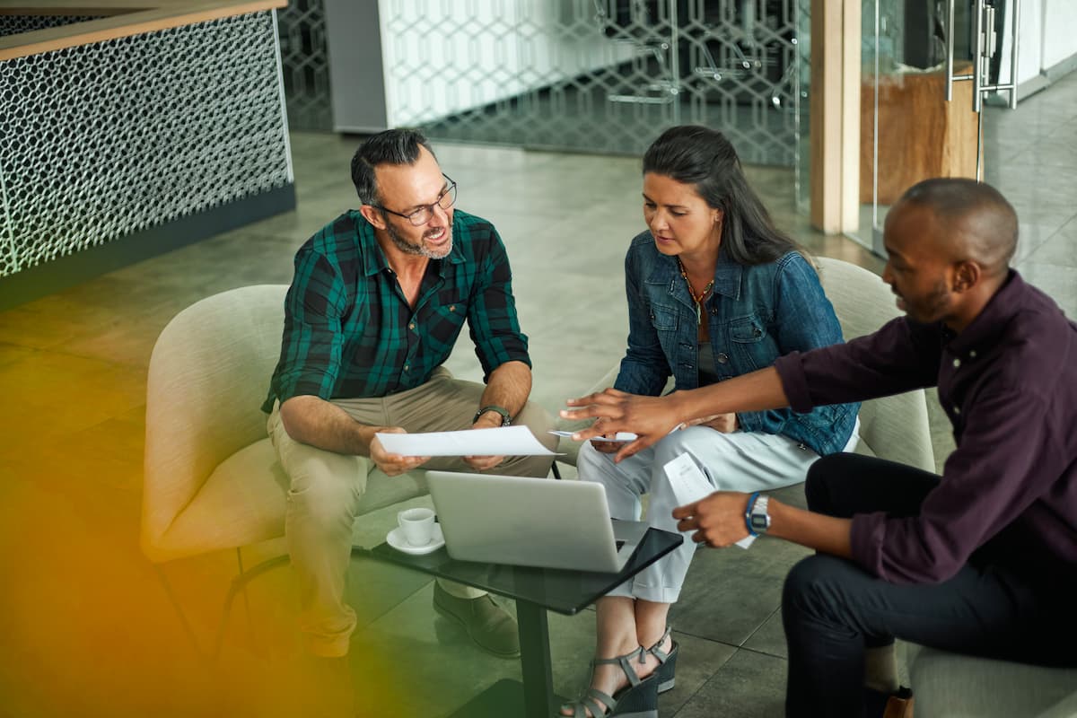 Business meeting with 3 business professionals