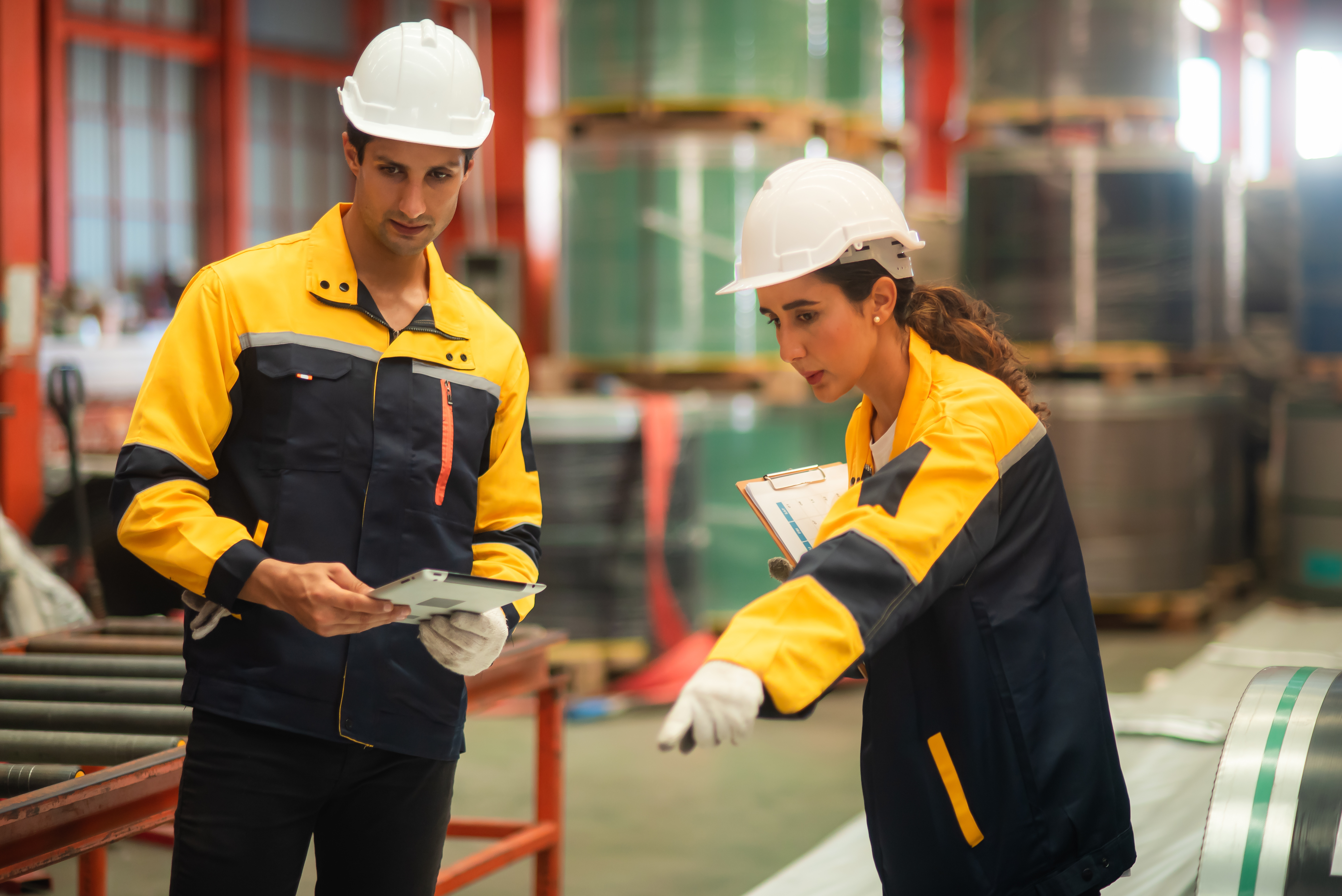 two construction workers in a warehouse