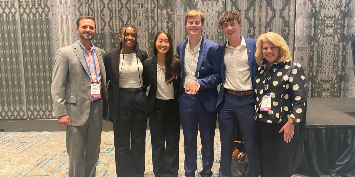 The winning team of the Spencer-RIMS 2025 Student Risk Management Challenge