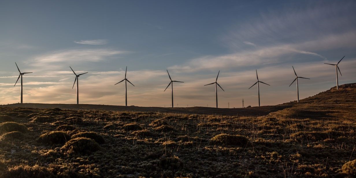 Wind turbines on a horizon.