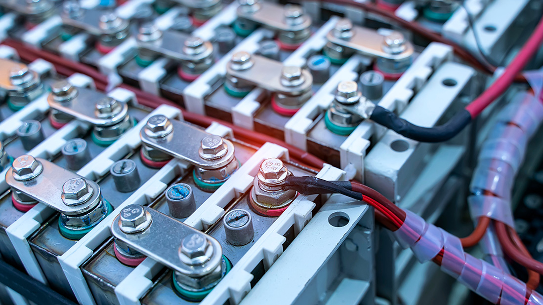 close-up of a battery pack with interconnected cells and wiring