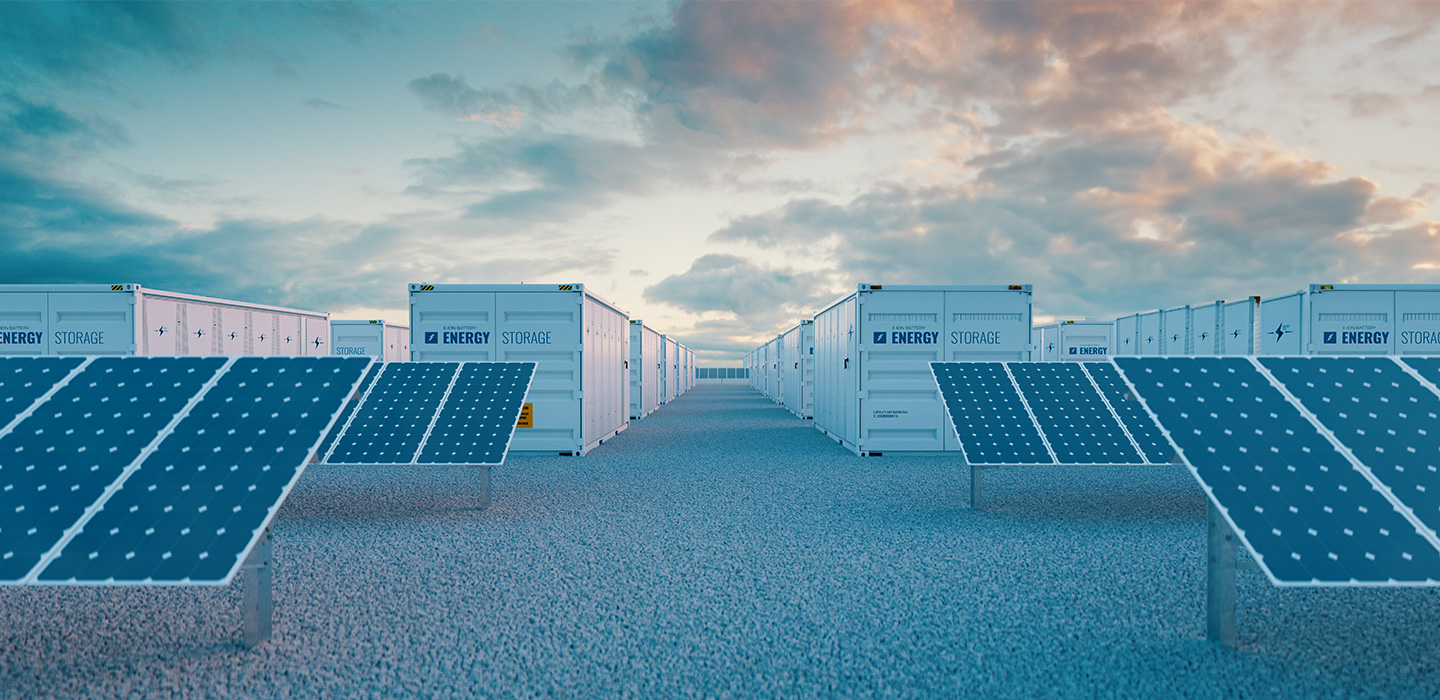 solar panels and energy storage containers at a renewable energy facility under a cloudy sky